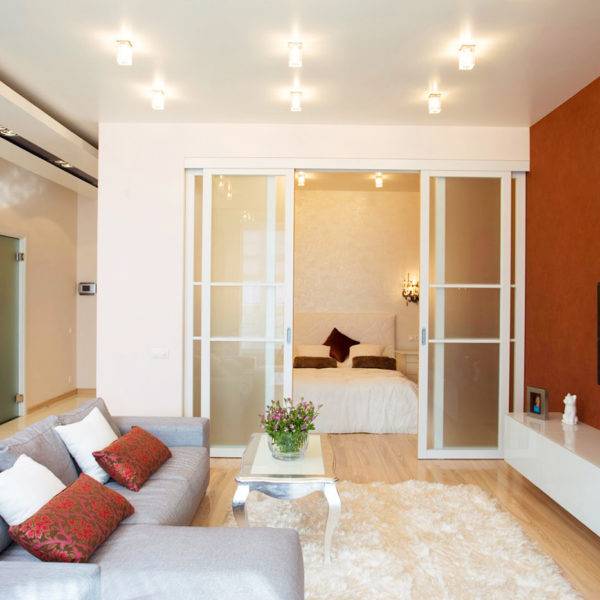 Комната с нишей в однокомнатной квартире: дизайн обустроенного интерьера, фото